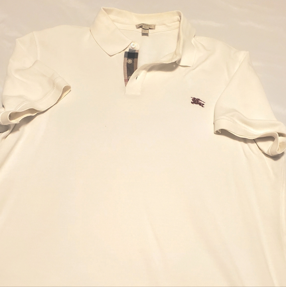 Three Burberry polo shirts-$60 each